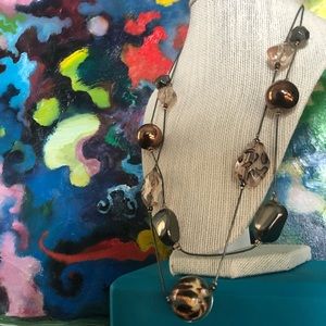 Necklace with gold, silver, leopard-print beads